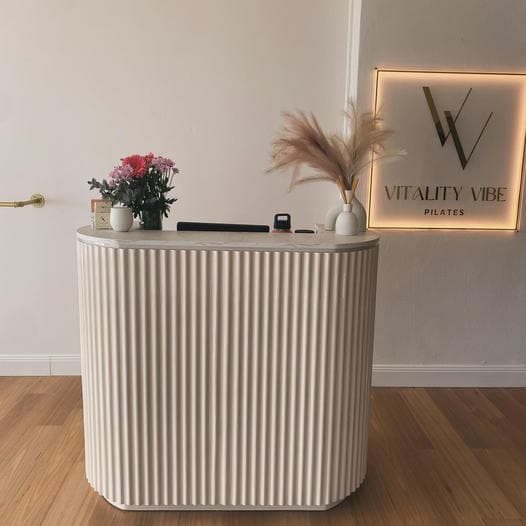 Vitality Vibe Pilates logo