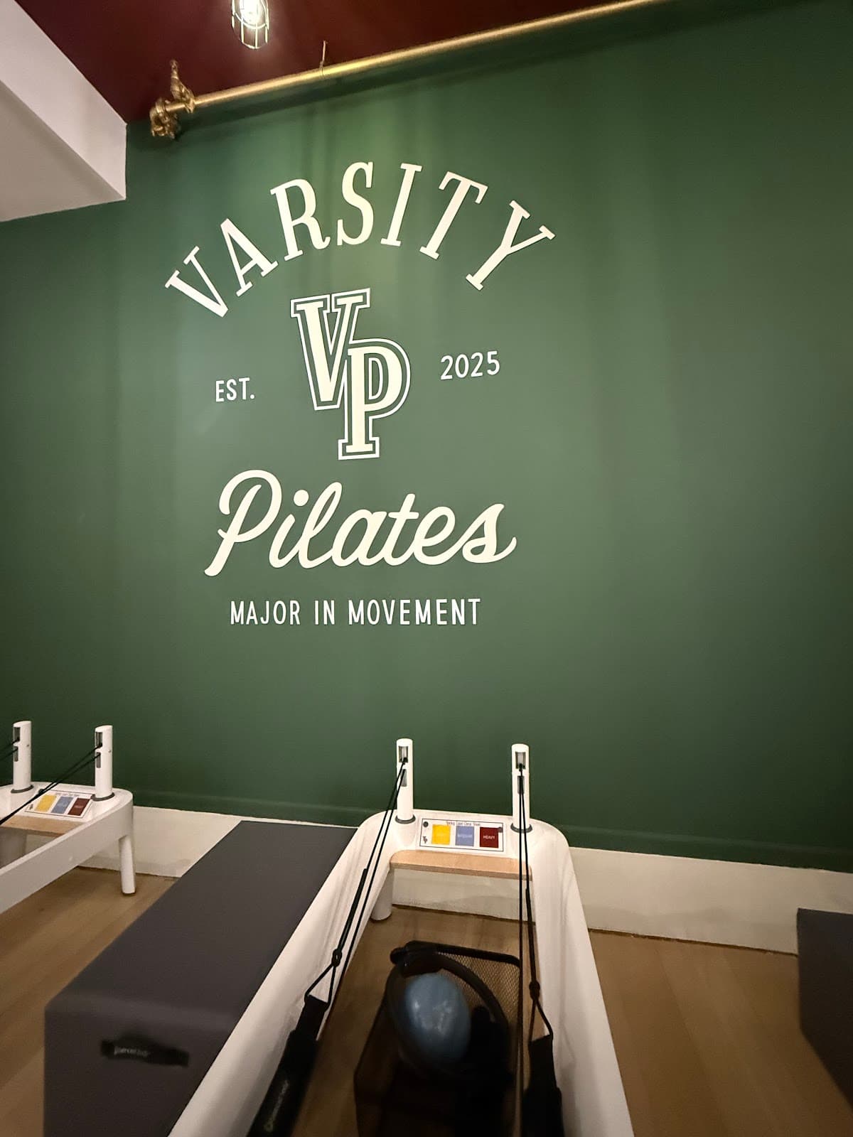 Varsity Pilates logo