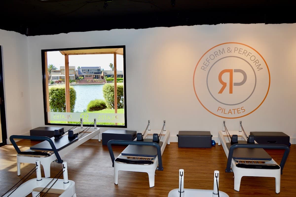 Reform and Perform Pilates logo