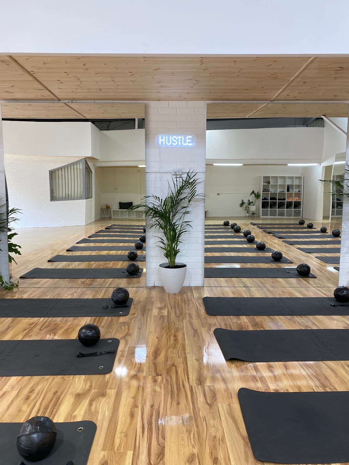Hustle and Flo Pilates logo