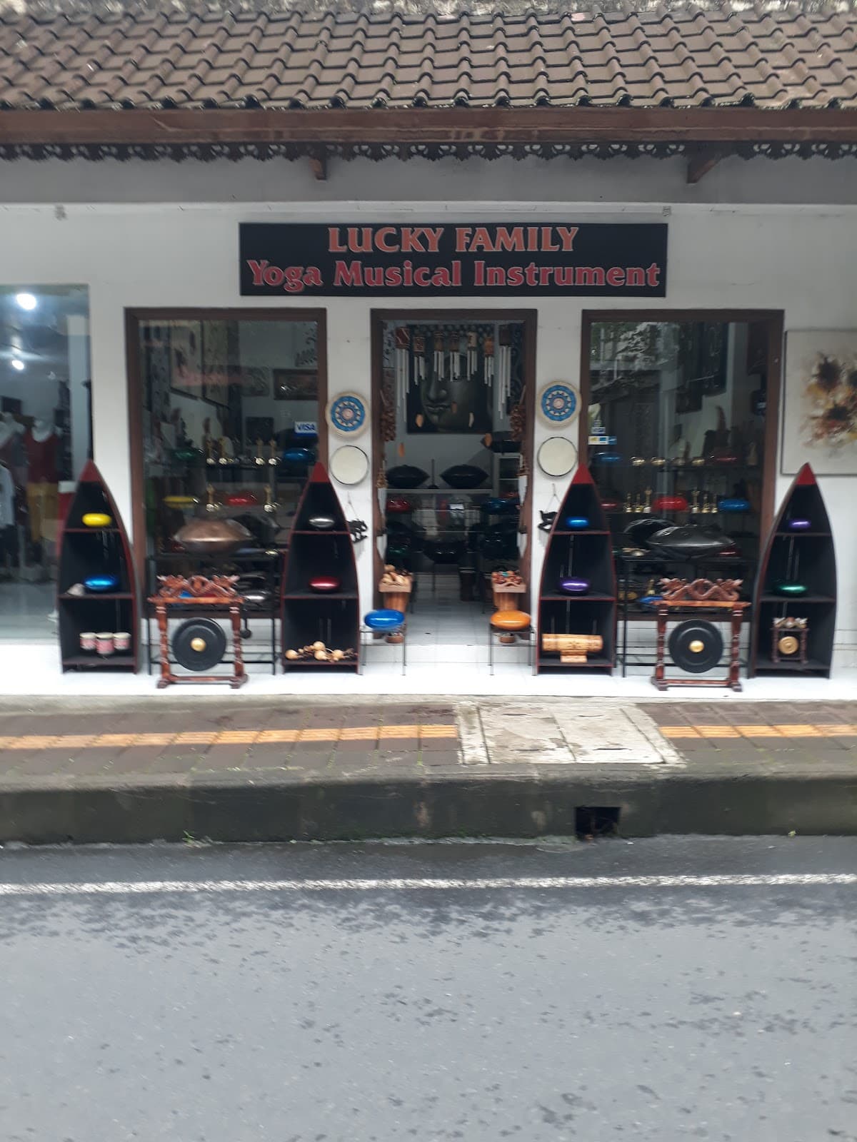 Lucky Family Yoga Musical Instrument logo