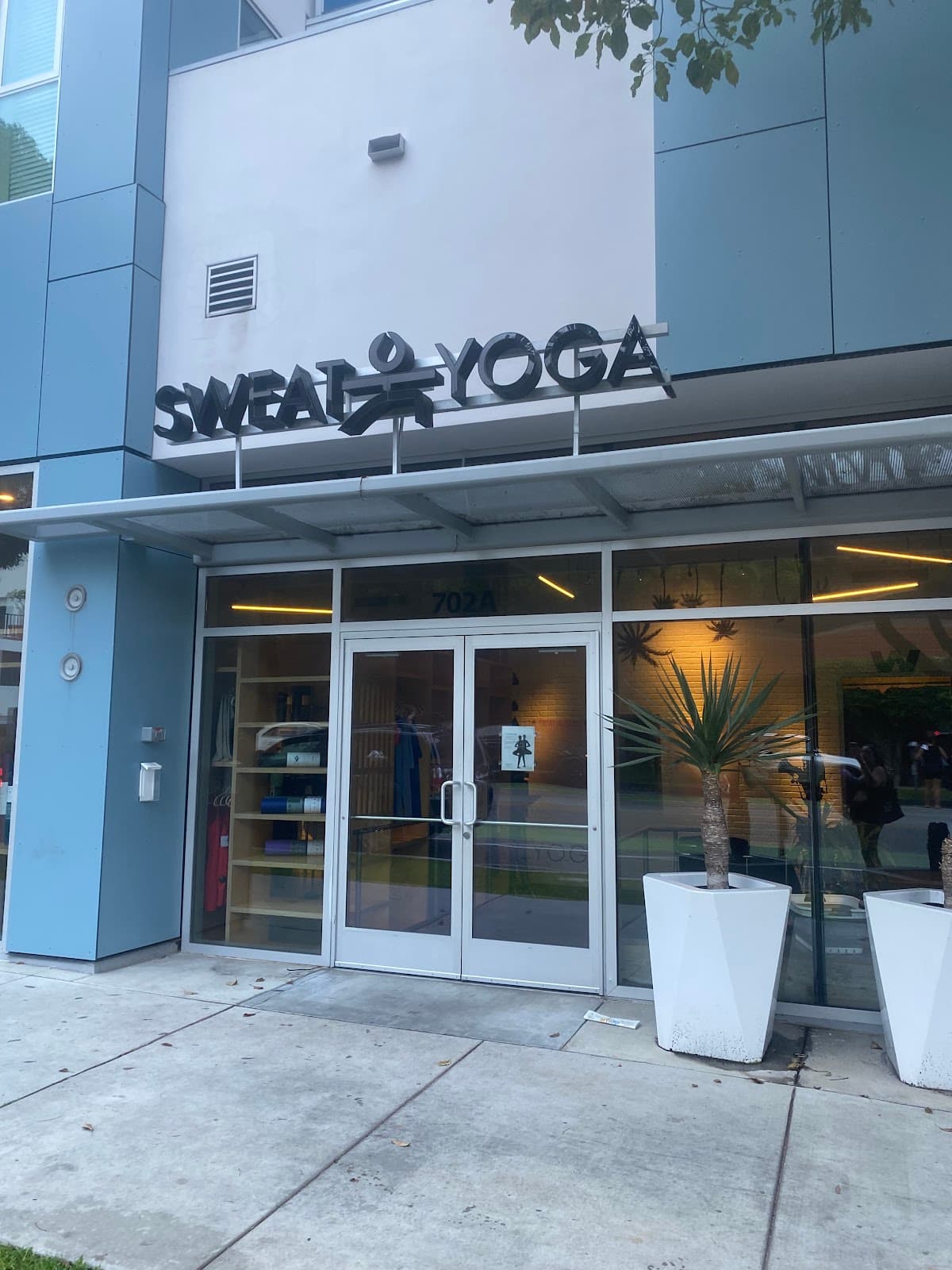 Sweat Yoga logo