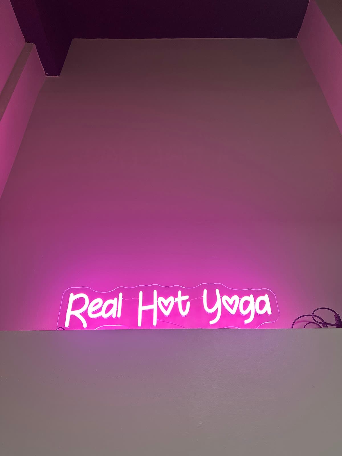 real hot yoga - Williamsburg logo